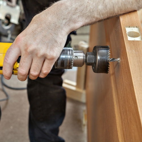 Person installing a door handle