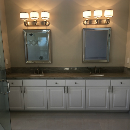 Double vanity with white cabinets