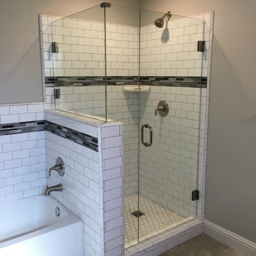 Walk-in shower with glass doors